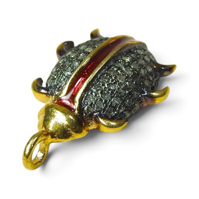 Lot 99 - A gem set and enamelled pendant, in the form...