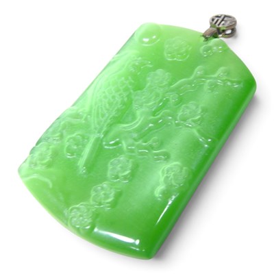 Lot 771 - A silver mounted Chinese carved jade coloured...