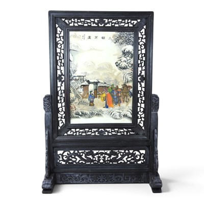 Lot 178 - A Chinese carved table screen, inset with a...