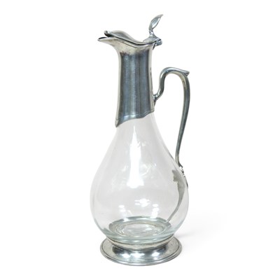 Lot 89 - A glass claret jug, with metal mounts and...
