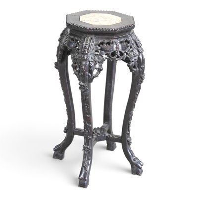 Lot 750 - A Chinese carved rosewood jardiniere stand,...