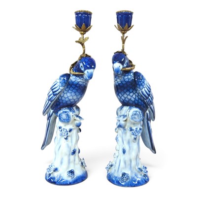 Lot 313 - A pair of blue and white pottery table...