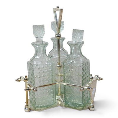 Lot 59 - After Christopher Dresser, a three bottle...