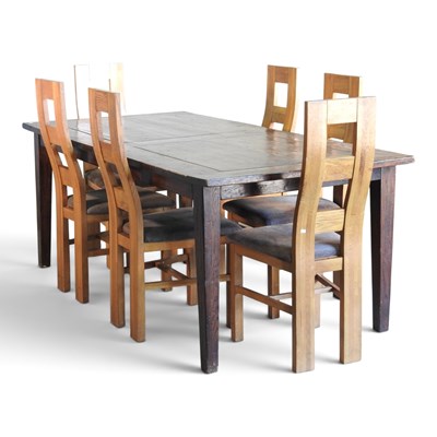 Lot 582 - A modern hardwood dining table, on square...