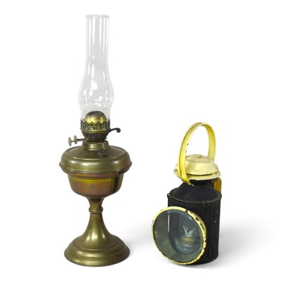 Lot 226 - A railway lamp, together with a brass oil lamp...