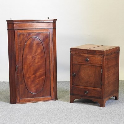 Lot 486 - A Victorian mahogany corner cupboard