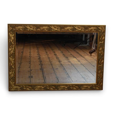 Lot 742 - A modern gilt wall mirror