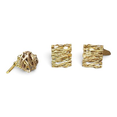 Lot 11 - A pair of 1970s textured gold cufflinks, of...