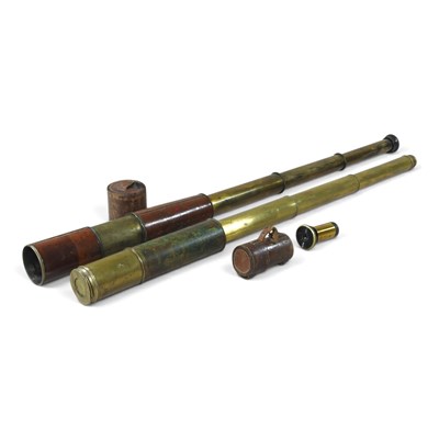 Lot 76 - An early 20th century leather clad brass four...