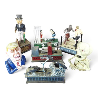Lot 375 - A collection of cast iron vintage style money...