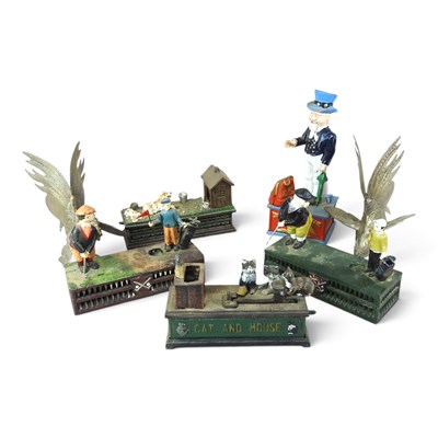 Lot 400 - A collection of cast iron vintage style money...