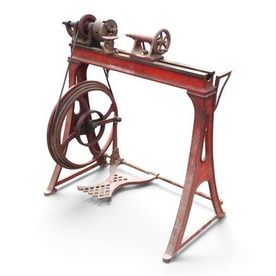 Lot 85 - An antique treadle lathe, on an A frame base
