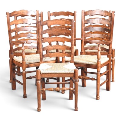 Lot 122 - A set of six rush seated ladderback dining...