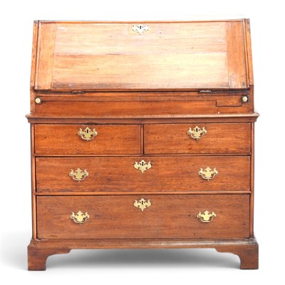 Lot 419 - An 18th century oak bureau, fitted with a...