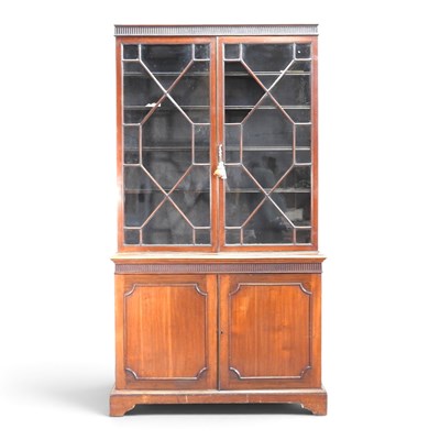 Lot 557 - An early 20th century cabinet bookcase, on...