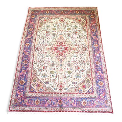 Lot 309 - A Persian tabriz carpet, with a central...