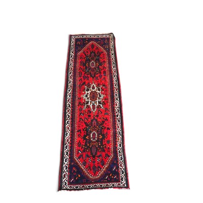 Lot 140 - A Persian qashgai runner, with three central...