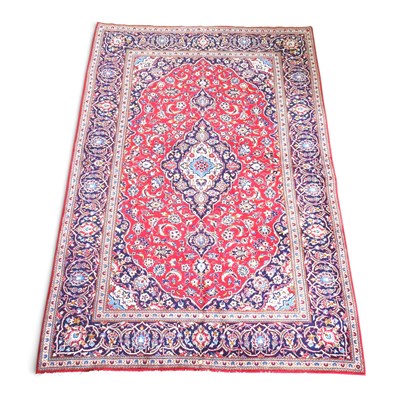 Lot 342 - A Persian kashan carpet, having a central...