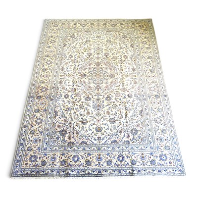 Lot 365 - A Persian kashan carpet, with foliate motifs,...