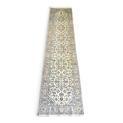 Lot 176 - A Persian kashan runner, with a row of central...