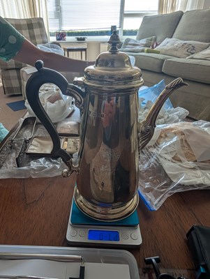 Lot 6 - A George V silver hot water pot, having a...