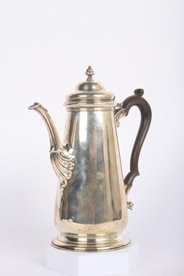Lot 6 - A George V silver hot water pot, having a...