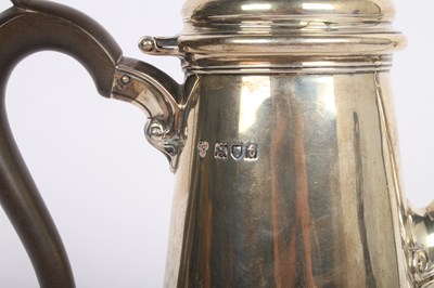 Lot 6 - A George V silver hot water pot, having a...