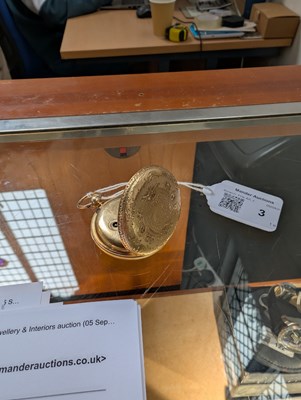 Lot 3 - An 18 carat gold pocket watch, the ornate dial...