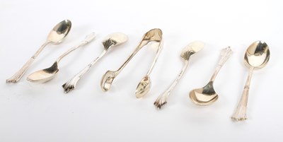 Lot 102 - A cased set of silver teaspoons and sugar nips,...