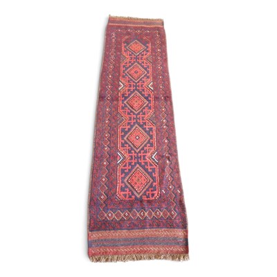 Lot 213 - A Persian kilim runner, with a row of hooked...