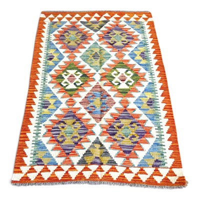 Lot 191 - A Persian kilim rug, with rows of diamonds,...