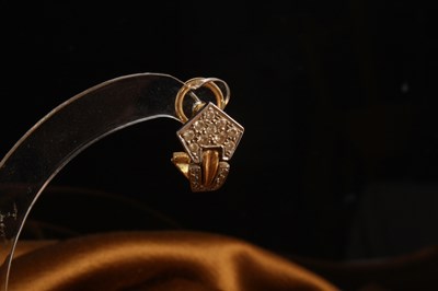 Lot 12 - A pair of 18 carat gold and diamond cluster...