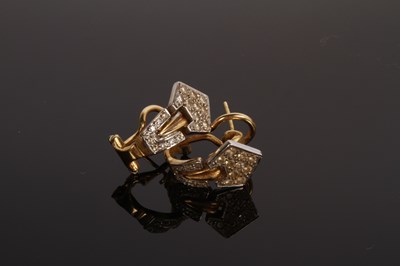 Lot 12 - A pair of 18 carat gold and diamond cluster...