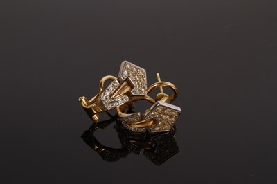 Lot 12 - A pair of 18 carat gold and diamond cluster...