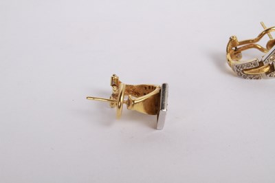 Lot 12 - A pair of 18 carat gold and diamond cluster...