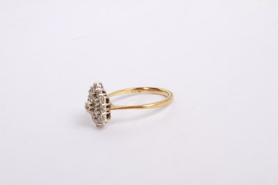 Lot 27 - An 18 carat yellow gold and diamond cluster...