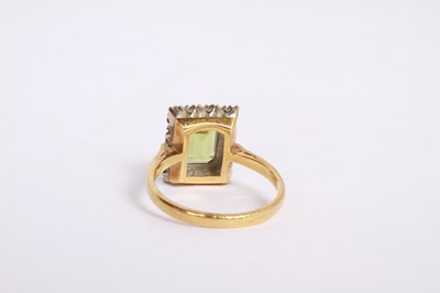 Lot 35 - An 18 carat gold, diamond and peridot cluster...