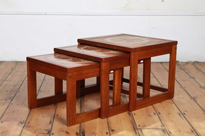 Lot 391 - A mid-century nest of tile topped occasional...