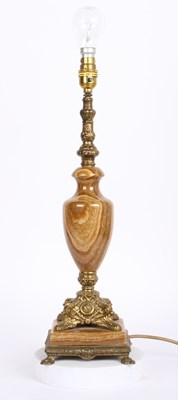 Lot 772 - A polished hardstone and gilt metal table lamp