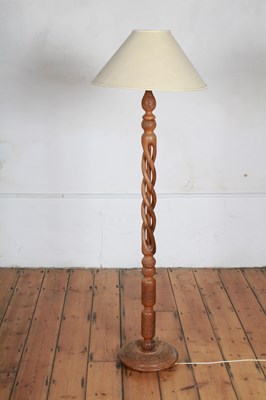 Lot 811 - A carved hardwood standard lamp
