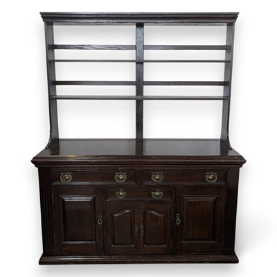 Lot 725 - An early 20th century oak dresser