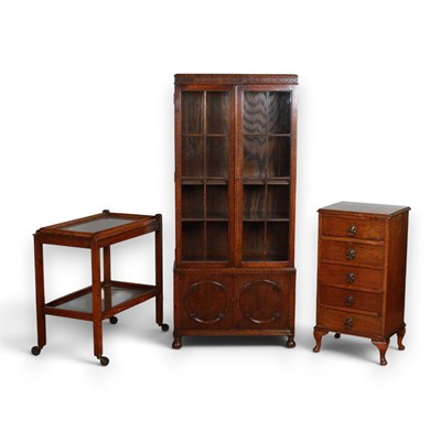 Lot 800 - A 1920s oak cupboard together with a small...