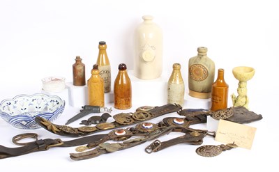 Lot 937 - A box of ceramics and clay bottles, horse...