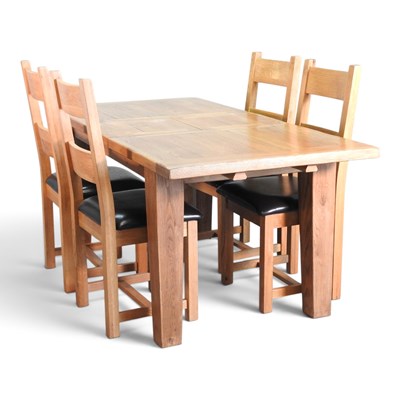 Lot 528 - A modern light oak extending dining table,...