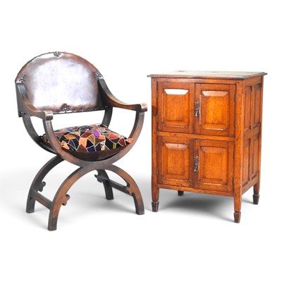 Lot 569 - A mid 20th century oak X frame armchair,...