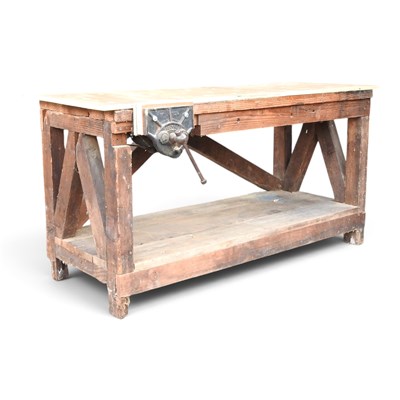 Lot 31 - A wooden work bench, fitted with a vice