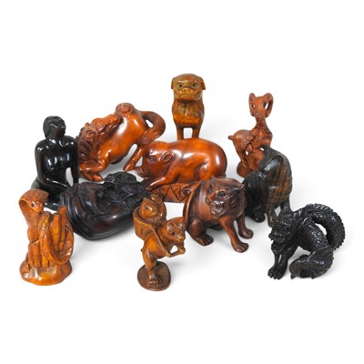 Lot 339 - A collection of Japanese carved wooden...