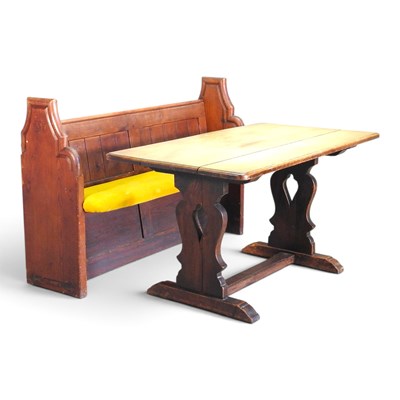 Lot 525 - A pitch pine church pew, 143cm wide, together...