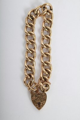 Lot 10 - A 9 carat gold curb link chain, having a...