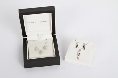 Lot 51 - A 9 carat white gold diamond earring and...